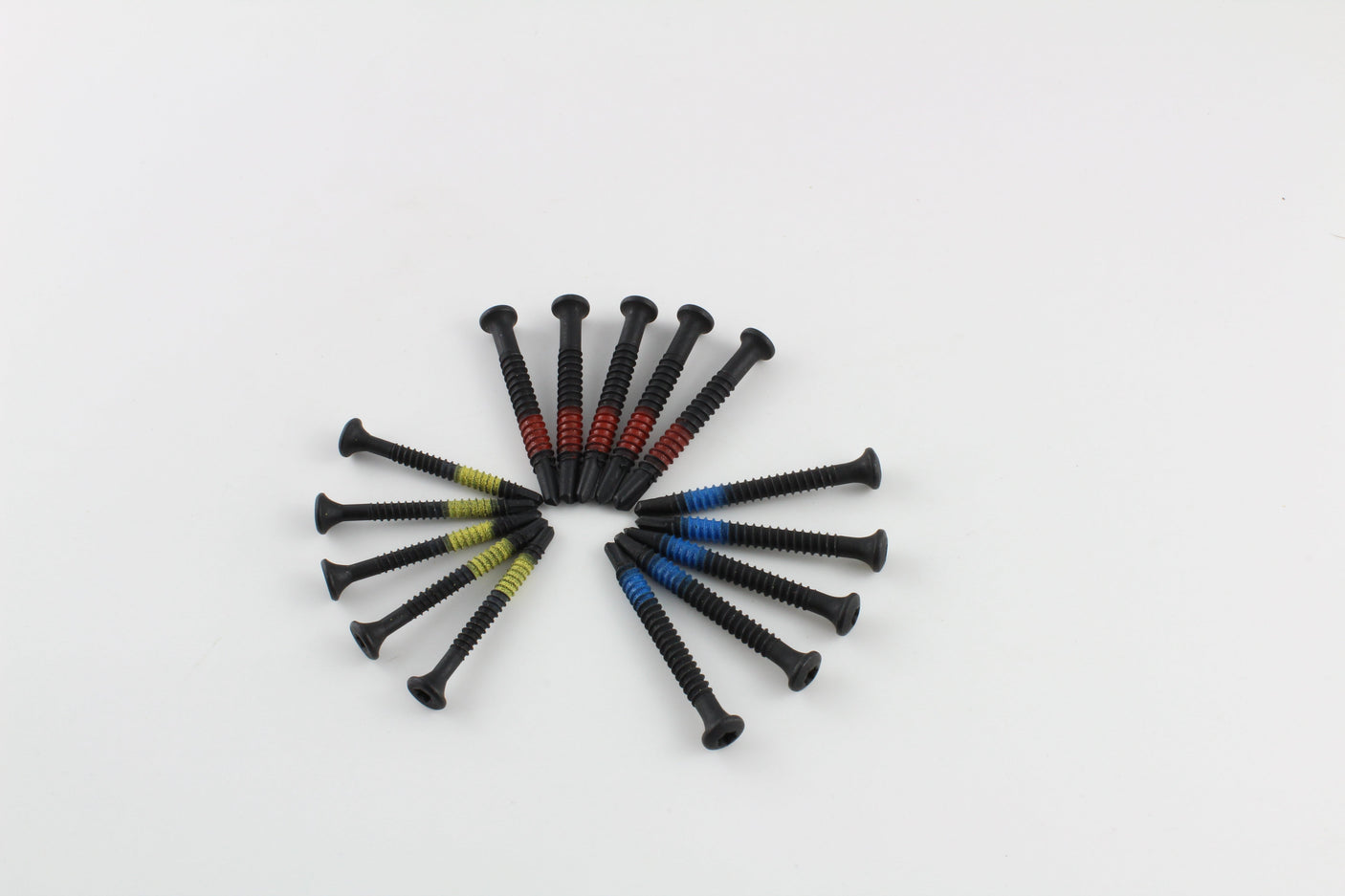 Lokko plug puller screws laid in a sunburst with the drive heads facing outward