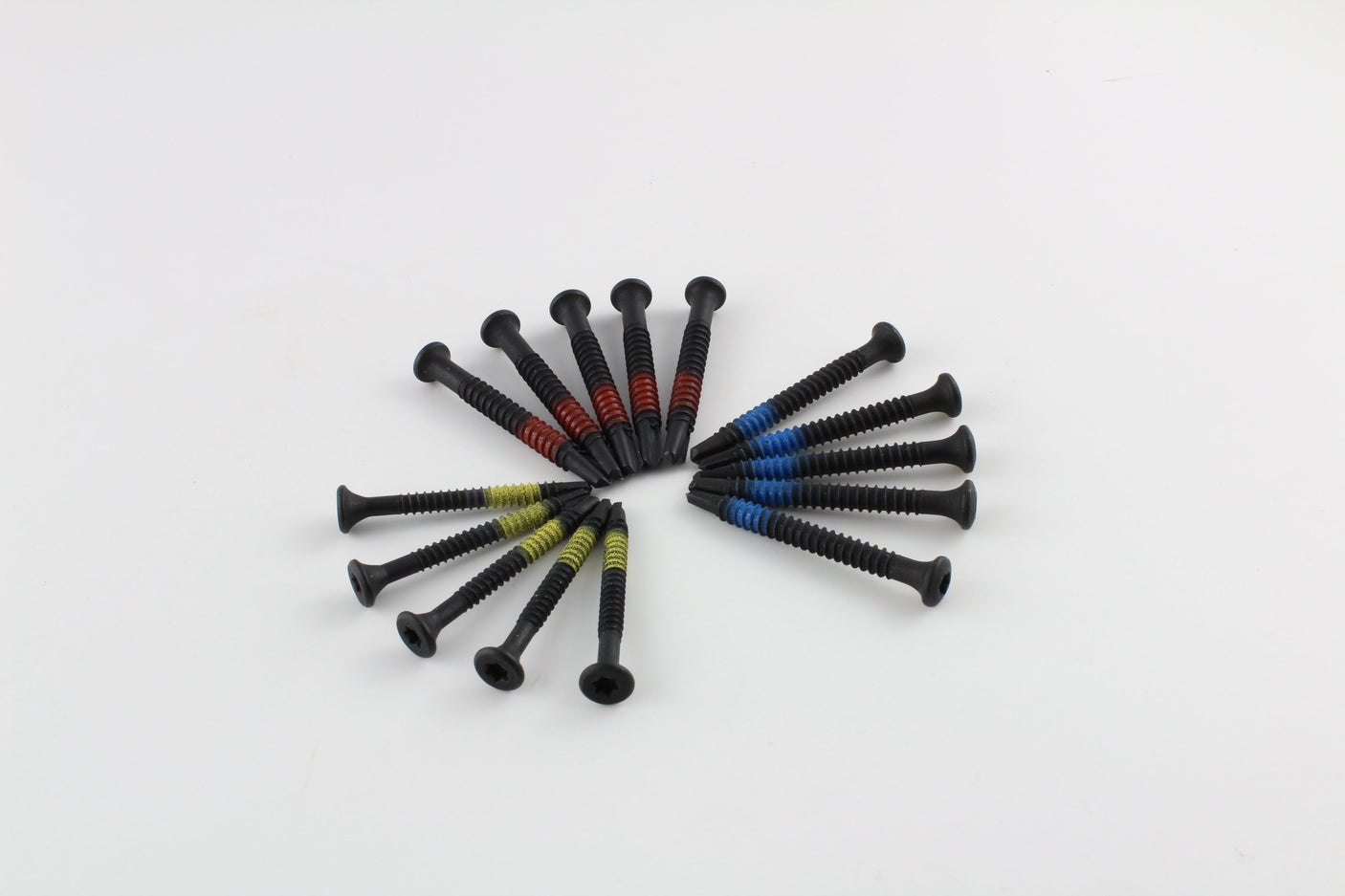 Lokko self-tapping screws arranged in a sunburst showing the countersunk star-drive heads