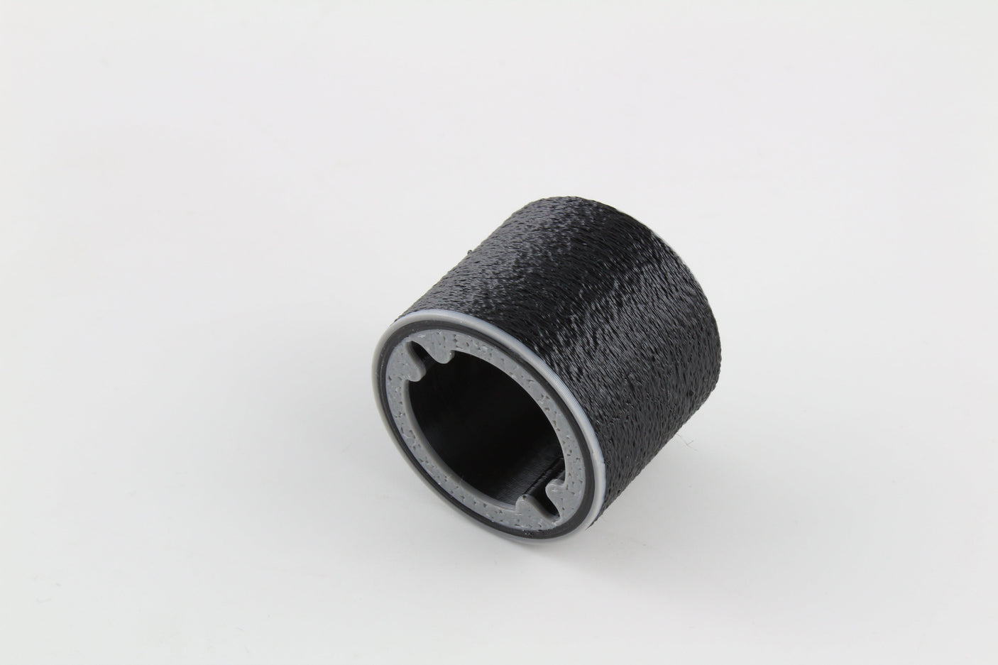 Close angled view of the bump key dampener and its keyway-shaped seating slot