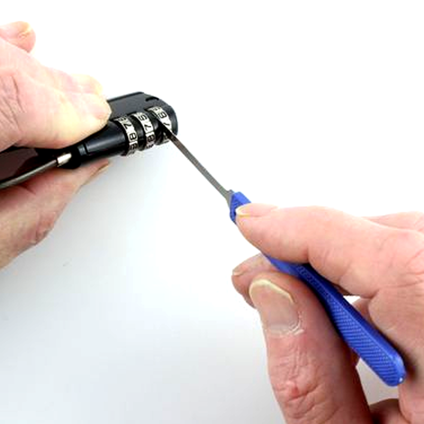Person decoding a combination lock with a miniknife tool on a white background
