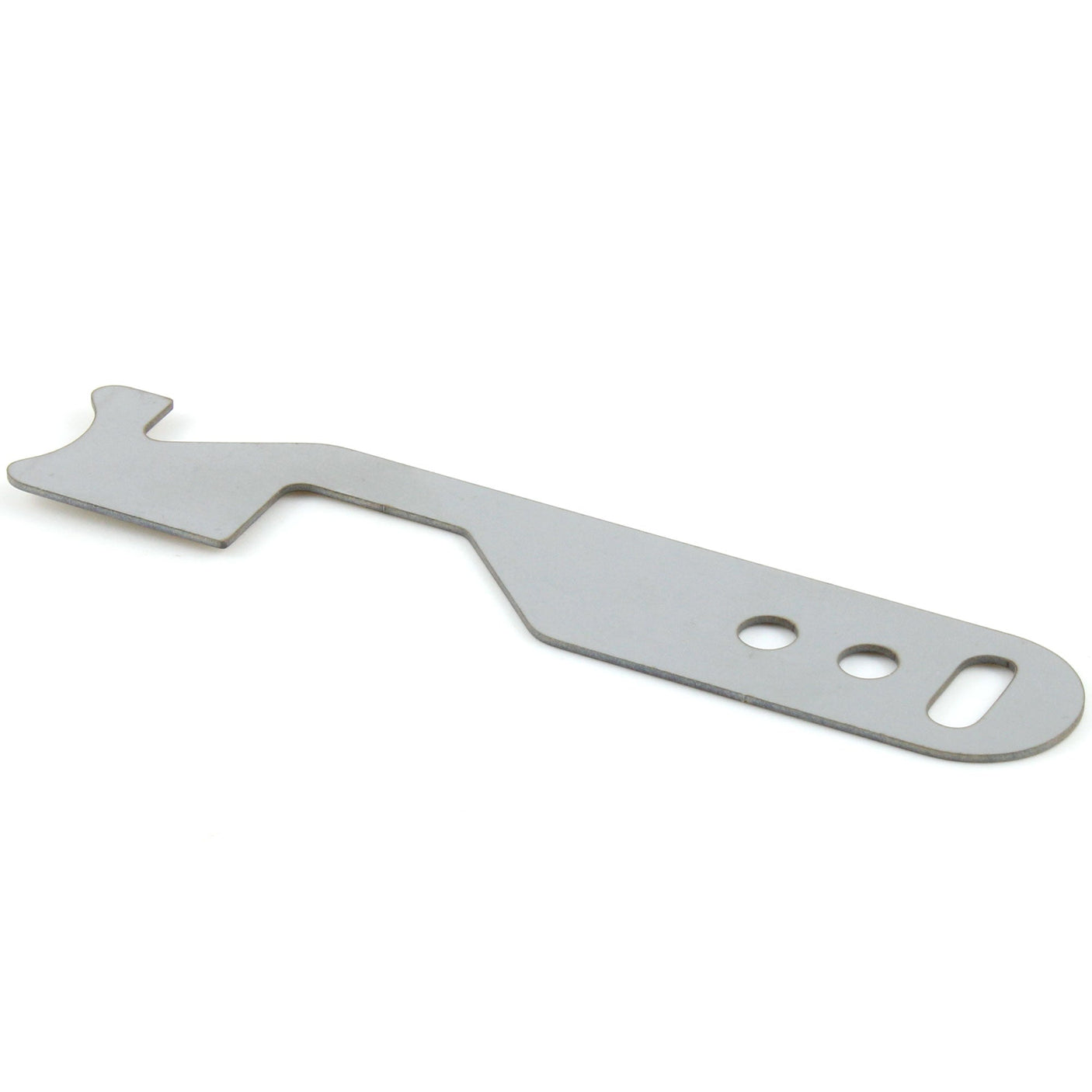 Lokko stainless shove-knife shown from the side, showing the flat blade, finger holes and keyring slot at the handle end