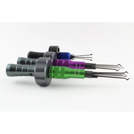 Three cross and cruciform lock picks with handles
