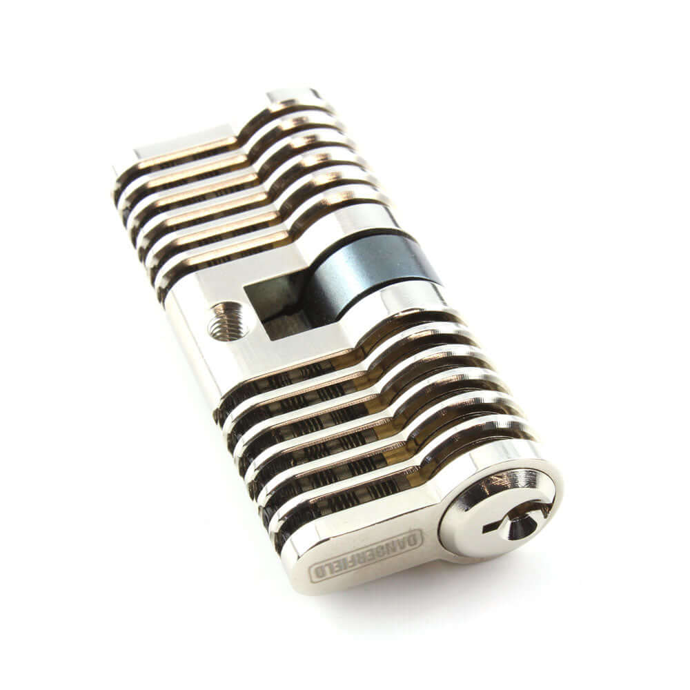 Cutaway window showing the pin stacks of the Dangerfield aluminum practice lock