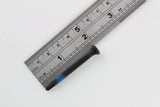 Studio arrangement of Lokko extraction screws with red, blue, and yellow thread markings