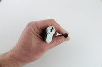 Lokko plug puller pull-screws grouped by colour on a clean studio backdrop