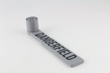 Full side view of the Dangerfield Bump Hammer laid flat, showing the handle and striking head