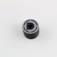 Top view of the bump key dampener showing the grey cap, central keyway slot and Dangerfield D logo