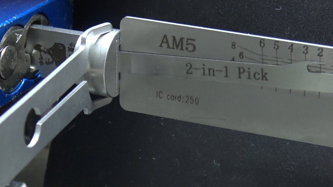 Lishi AM5 pick engaged with an American Lock padlock cylinder