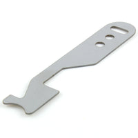 Lokko stainless shove-knife laid flat, showing the keyring slot, two finger holes and the hooked latch-driving tip