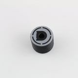 Top view of the bump key dampener showing the grey cap, central keyway slot and Dangerfield D logo