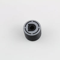 Top view of the bump key dampener showing the grey cap, central keyway slot and Dangerfield D logo
