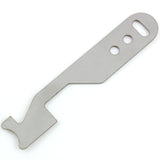 Close view of the Lokko shove-knife working end showing the stepped hooked tip cut into flat stainless steel