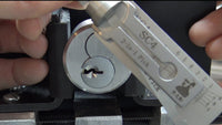 Lishi SC4 Schlage pick positioned at a lock cylinder