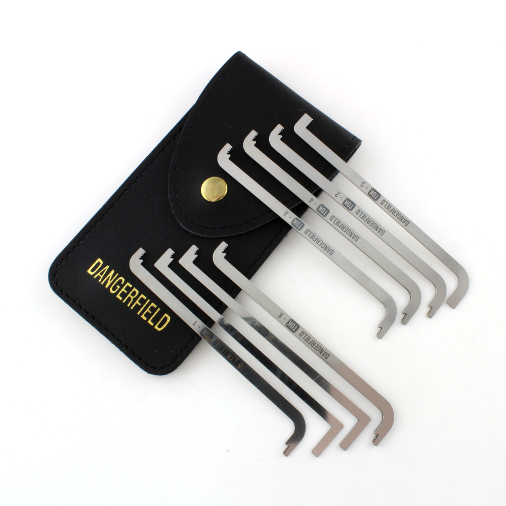 Dangerfield extended Top of Keyway tension wrenches fanned out beside their leather case